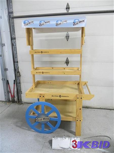 Blue Moon Wood 5 shelf display. Wheel are jus...