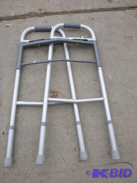 lot 13 image: Fold Up Aluminum Walker...
