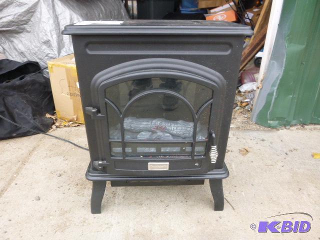 lot 57 image: Countryside Electric Heater Fireplace with Fl...
