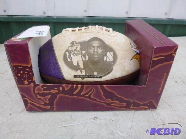lot 86 image: Randy Moss Vikings Football...