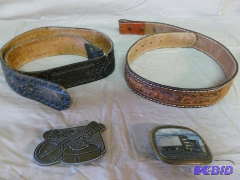 lot 155 image: This lot consists of two collectible belt buc...