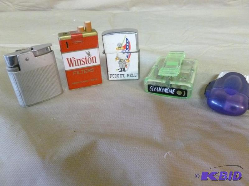 lot 165 image: Lot of five collectible cigarette lighters....