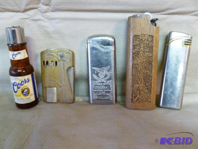 lot 167 image: Lot of five collectible cigarette lighters....