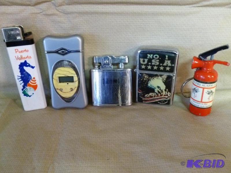 lot 168 image: Lot of five collectible cigarette lighters....