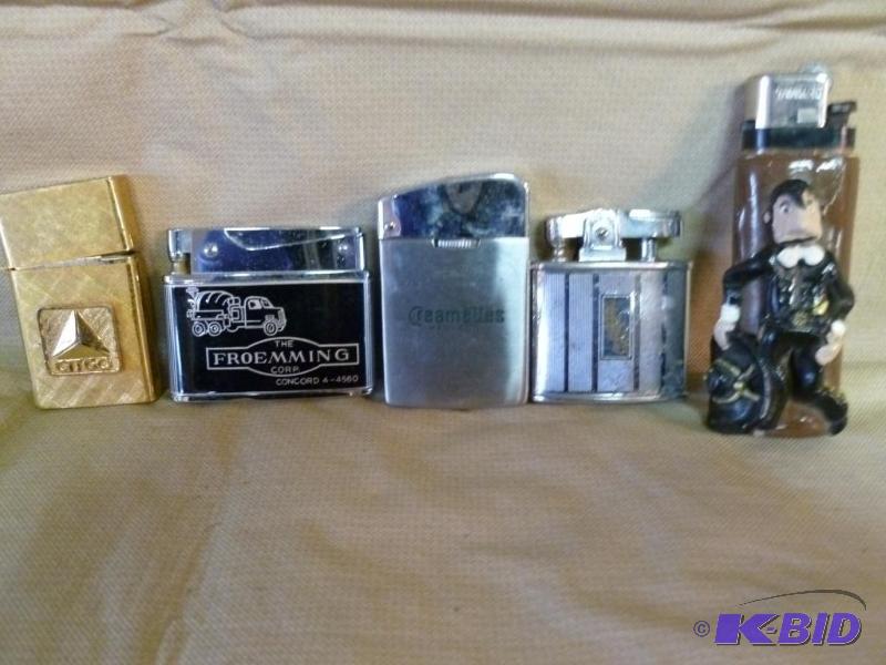 lot 171 image: Lot of five collectible cigarette lighters....