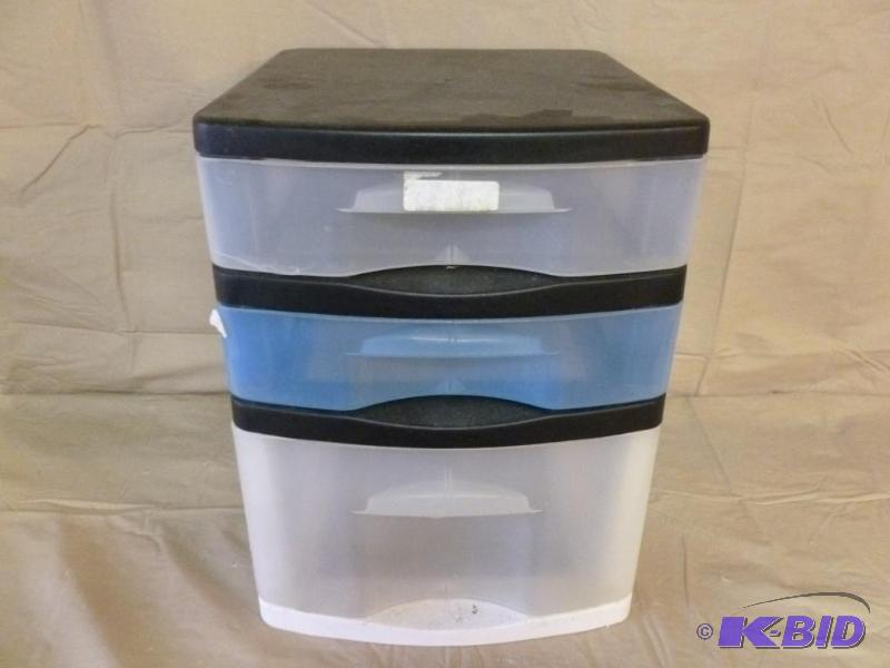lot 203 image: Three drawer heavy gage plastic storage bin....