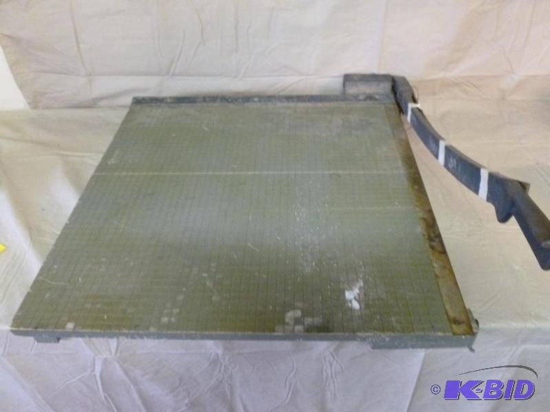 lot 221 image: Large Milton Bradley paper cutter that measur...