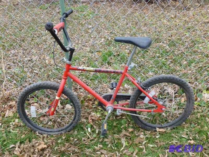 lot 234 image: Huffy 2 Bada 14" bike, tires are flat....