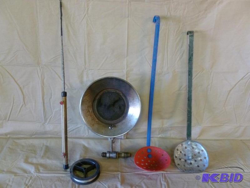 lot 25 image: Lot of ice fishing items that includes a prop...