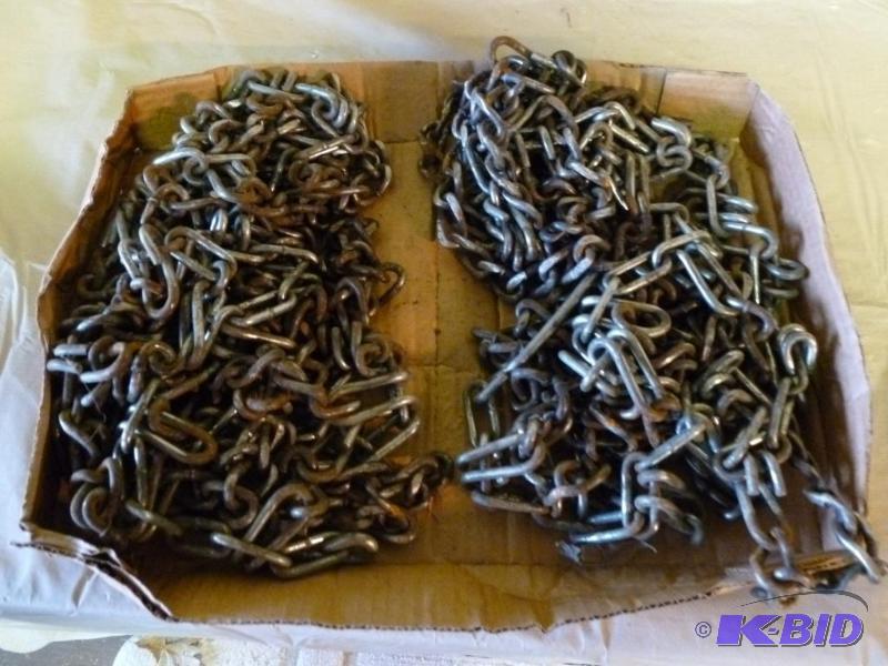 lot 62 image: A pair of lawn tractor tire chains....