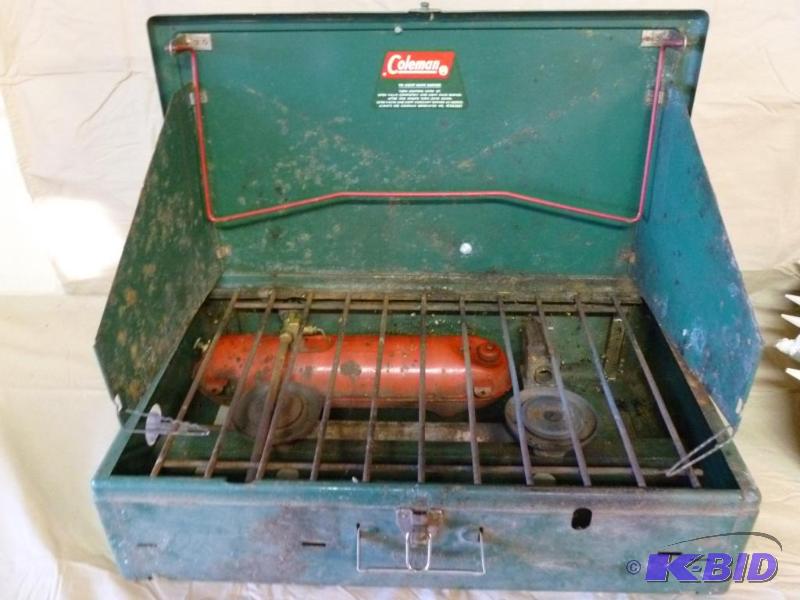 lot 63 image: Coleman two burner camp stove model 413F....