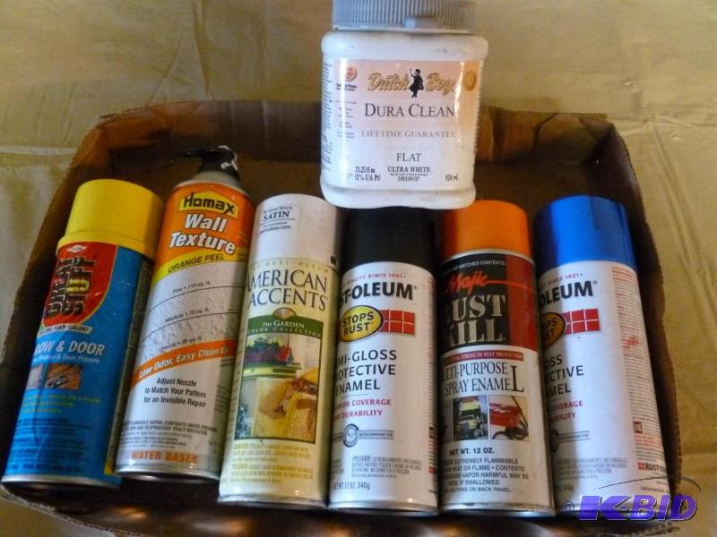 lot 64 image: This lot consists of four cans of spray paint...