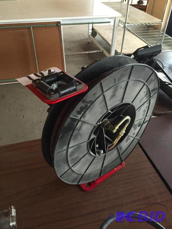 lot 102 image: ReelCraft air hose reel with hose....
