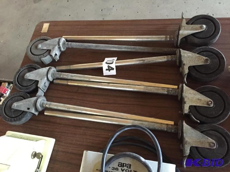 lot 104 image: 7 Metro rack wheel units....