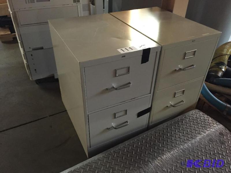 lot 111 image: 2 wide 2-drawer metal filing cabinets....