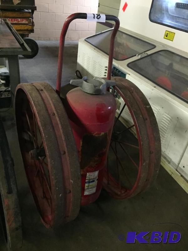 lot 18 image: Antique fire extinguisher cart....