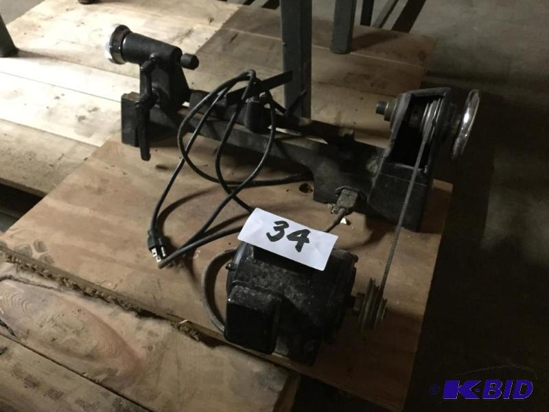 lot 34 image: Small bench top lathe with motor....