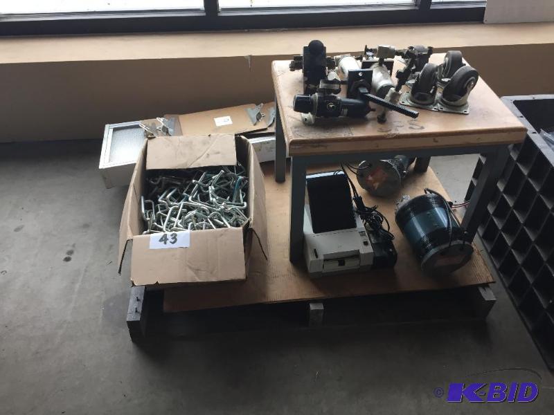 lot 43 image: Pallet lot of misc motors, casters, metal bra...