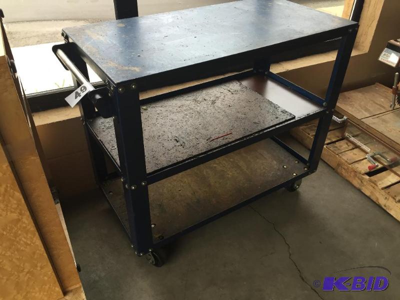 lot 49 image: Metal shop cart....