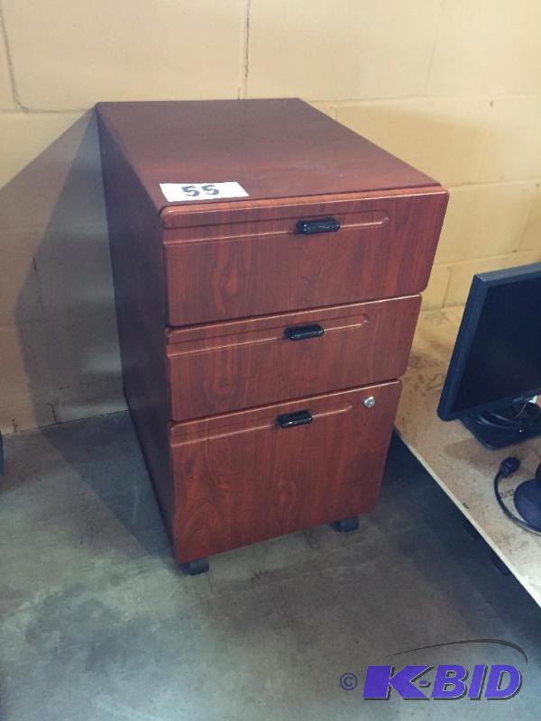 lot 55 image: 3 drawer cabinet on casters....