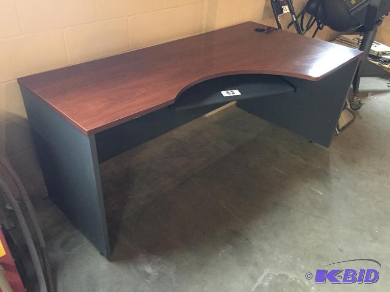 lot 62 image: Corner desk with key board tray....