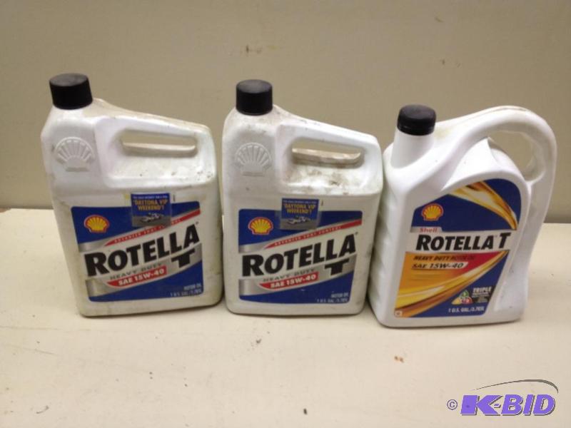 lot 209 image: Motor Oil  Lines on Jugs show Fill Level ...
