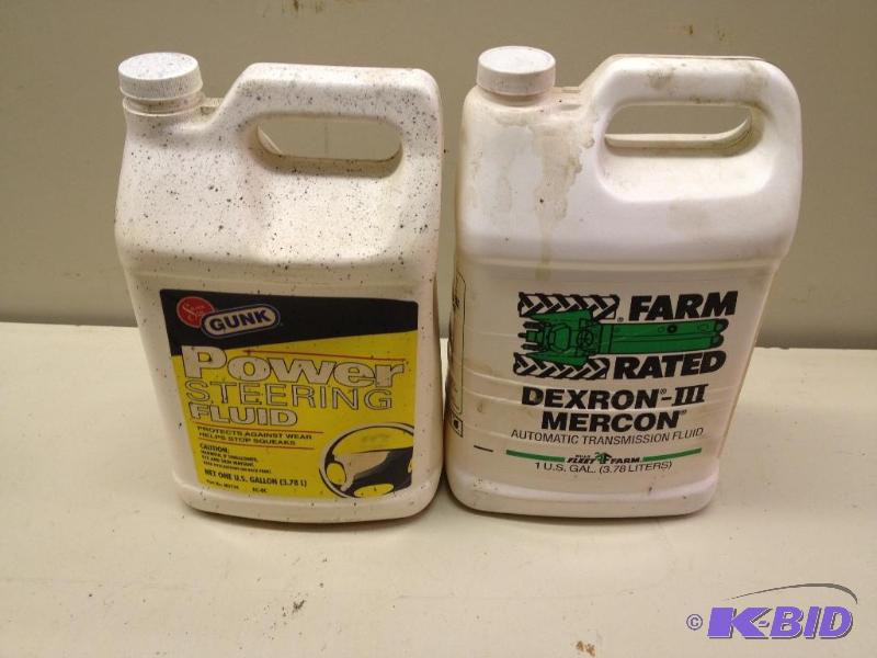 lot 211 image: 1 Gal Power Steering Fluid 12 Gal Transmissi...