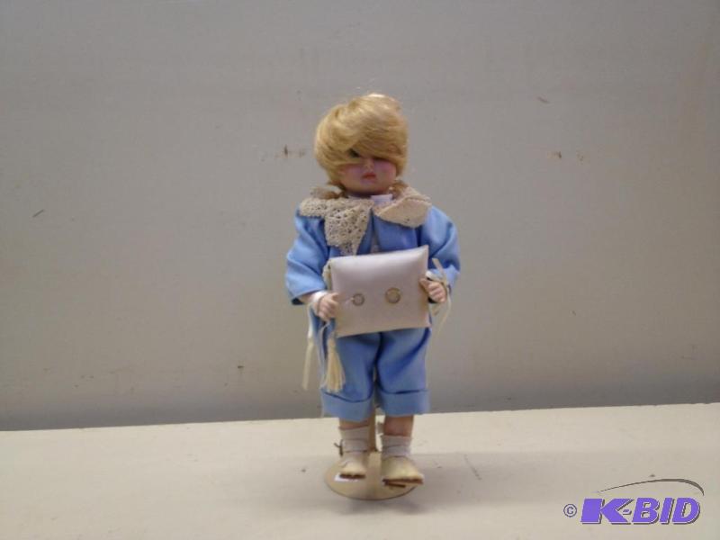 lot 80 image: Porcelain Doll...