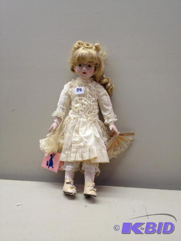 lot 88 image: Porcelain Doll...