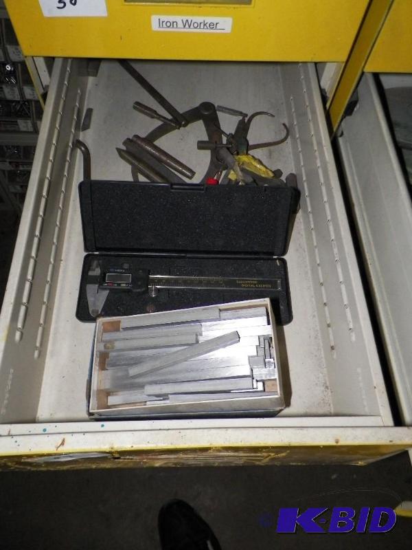 lot 57 image: Caliper and items shown
