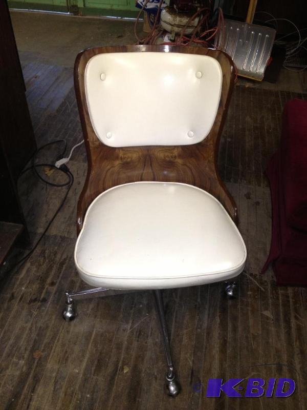 4 Wood Dining Chairs on Casters  one chair is...