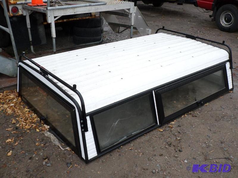 lot 9 image: Radco 8ft Aluminum Pick-Up Truck Topper With ...