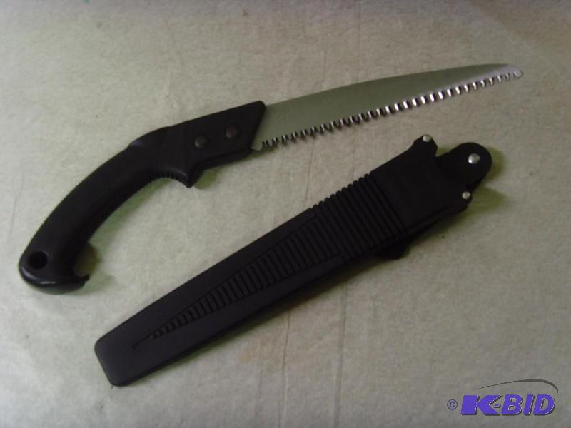 lot 203 image: Camping Saw with Blade Cover