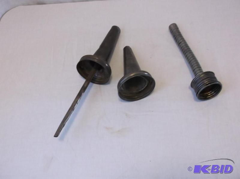 lot 43 image: Lot with vintage gas & oil funnels....