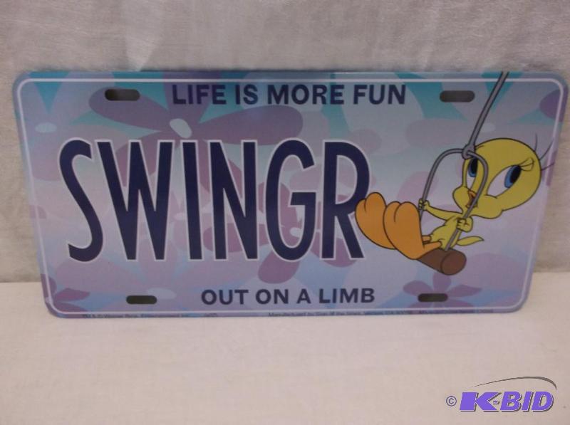 lot 54 image: Embossed metal license plate sign....