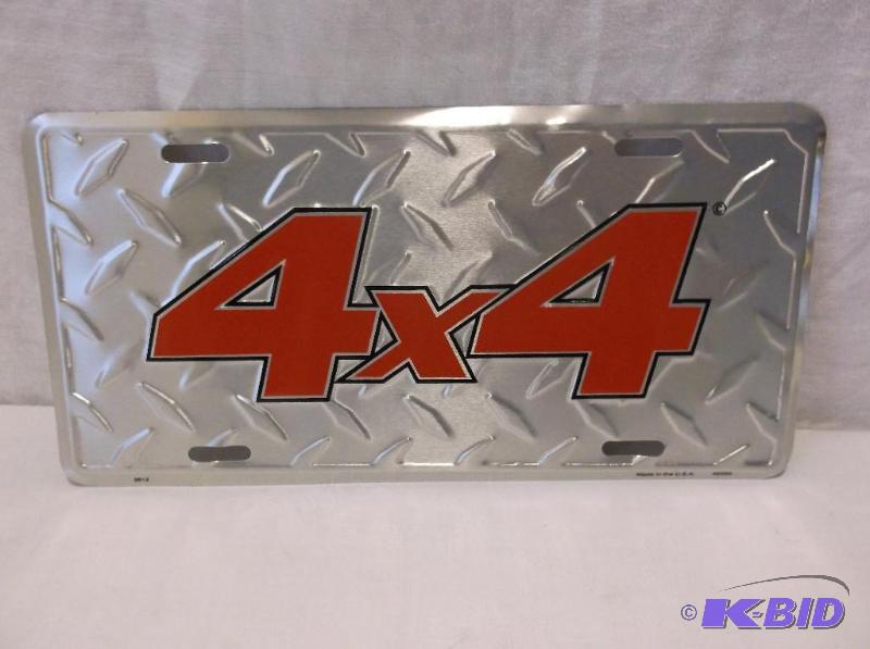 lot 55 image: Embossed metal license plate sign....