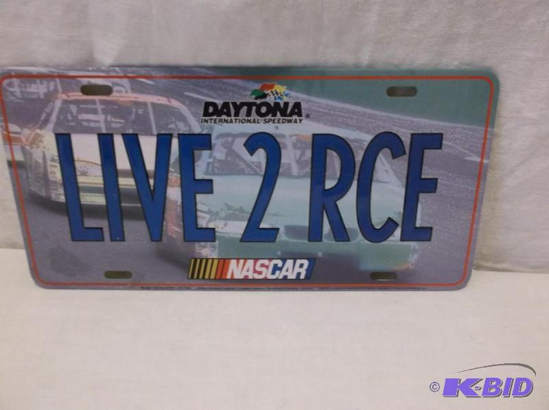 lot 59 image: Embossed license plate sign....