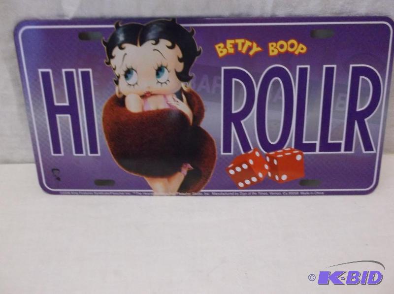 lot 60 image: Embossed metal license plate sign....
