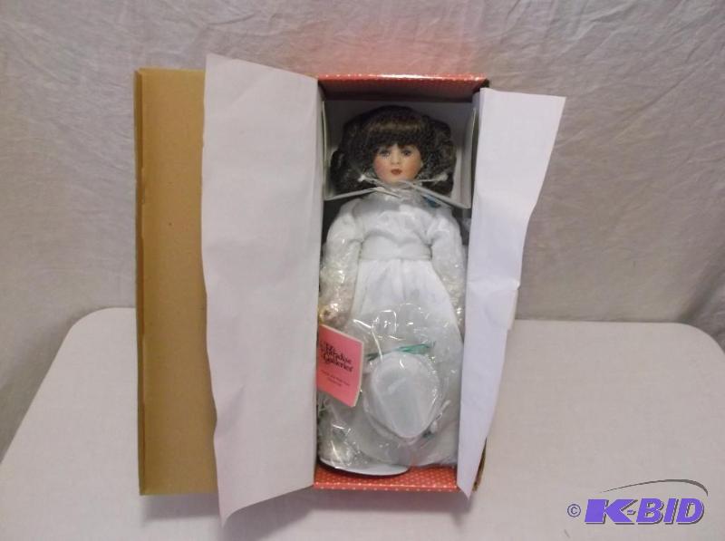 lot 65 image: Beautiful hand painted porcelain doll 13"...