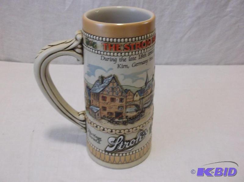 lot 78 image: Embossed Strohs beer stein in great conditio...