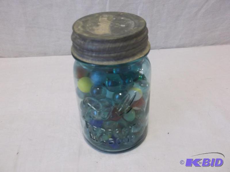 lot 80 image: Vintage canning jar filled with marbles....