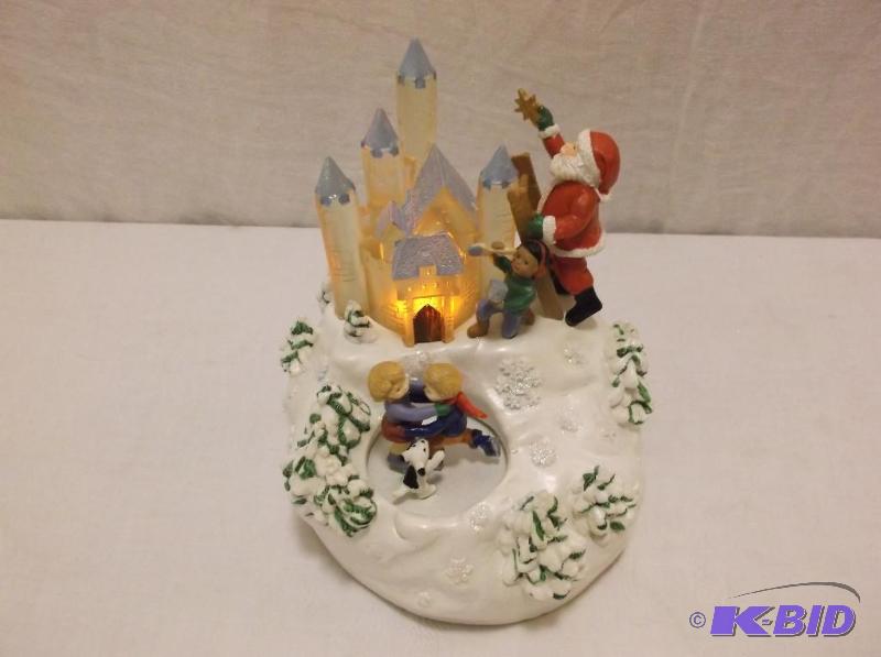 lot 98 image: Avon musical Santas magical castle....