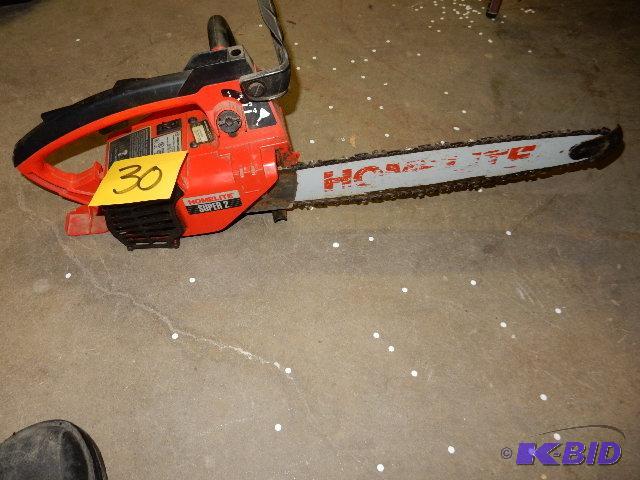 Homelite Super II Chain Saw. Looks like a 16i...