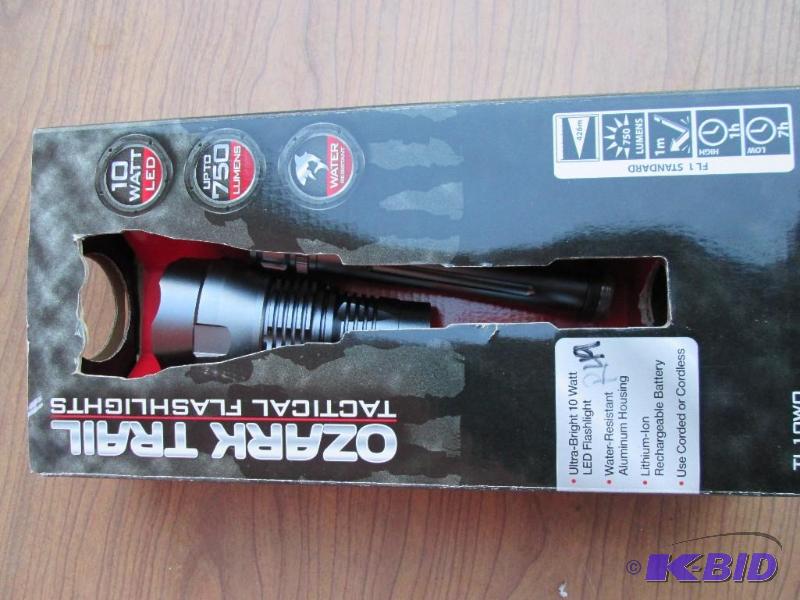 lot 102 image: Ozark Trail flashlight...
