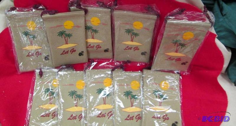 lot 163 image: Qty 10 small tan bags that has a tree with su...