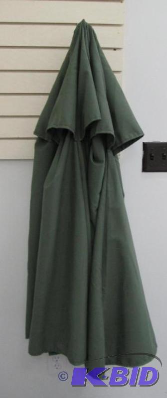 lot 229 image: The top of the umbrella the fabric is green...