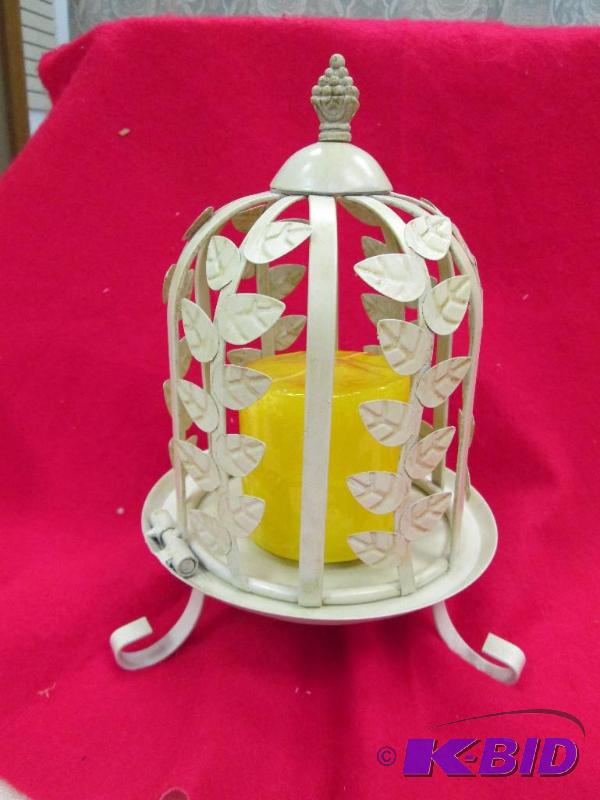 lot 252 image: Bird cage with candle in...
