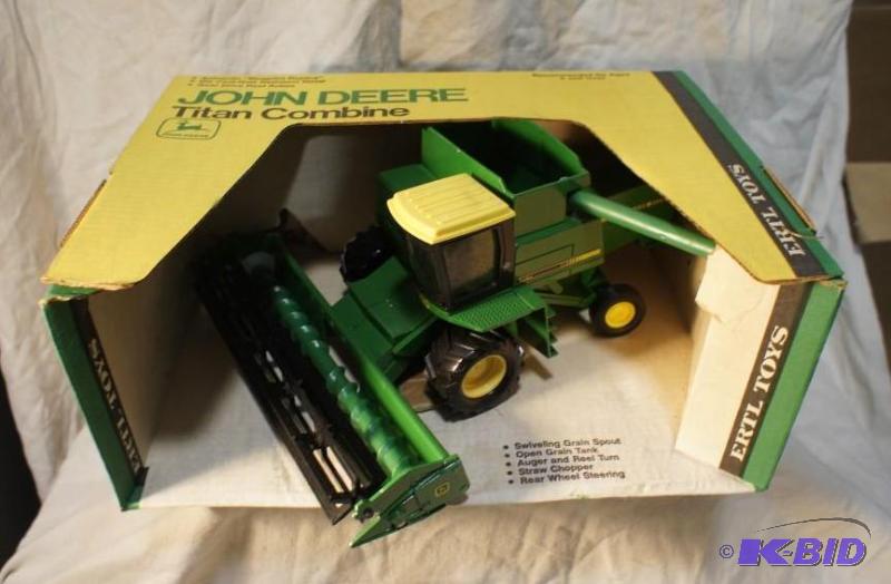 lot 1 image: New In Box John Deere Titan Combine # 524 - 1...
