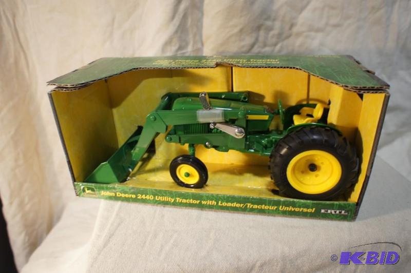 lot 18 image: New In Box John Deere 2440 Utility Tractor Wi...