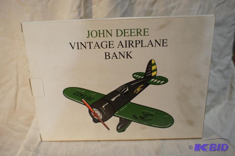lot 20 image: New In Box John Deere Vintage Airplane Bank -...